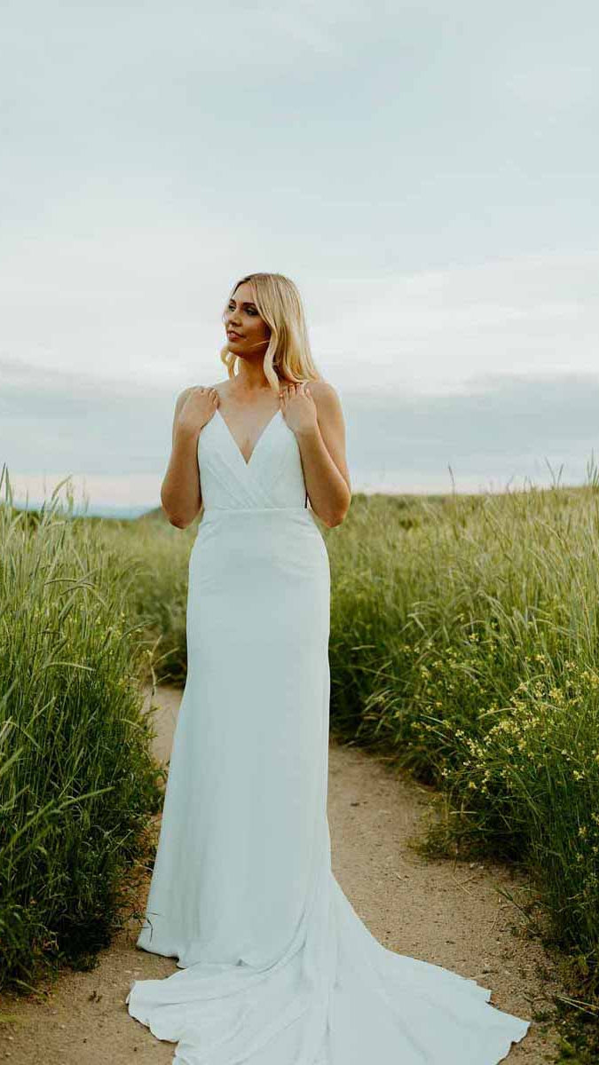 Stella York 7669 Modern Wedding Dress with Side Cutouts