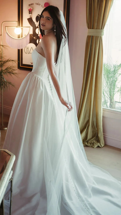 Strapless Mikado A-Line Wedding Gown with Architectural Seaming and Pockets Stella York SY8274