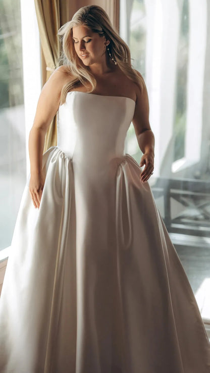 Strapless Mikado A-Line Wedding Gown with Architectural Seaming and Pockets Stella York SY8274