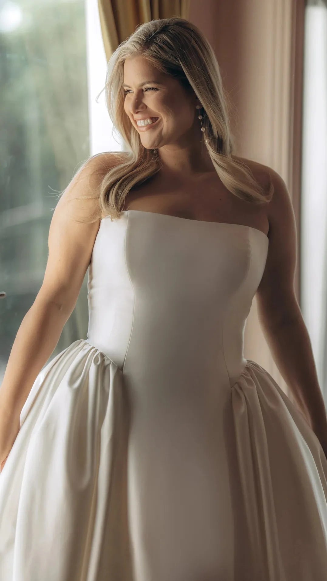 Strapless Mikado A-Line Wedding Gown with Architectural Seaming and Pockets Stella York SY8274