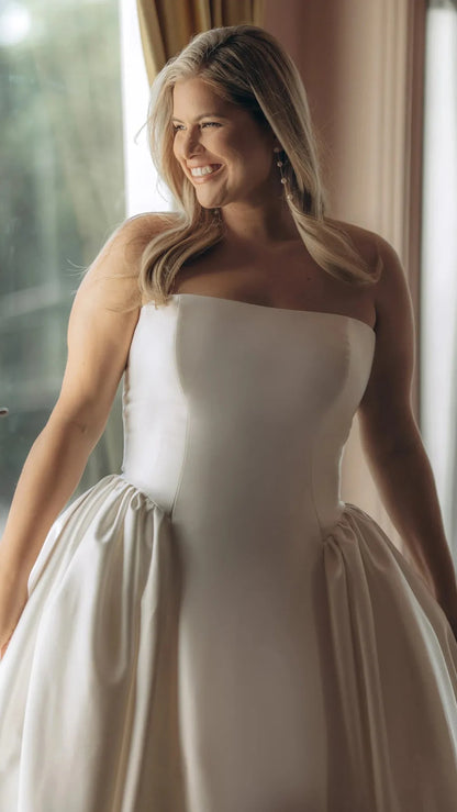 Strapless Mikado A-Line Wedding Gown with Architectural Seaming and Pockets Stella York SY8274